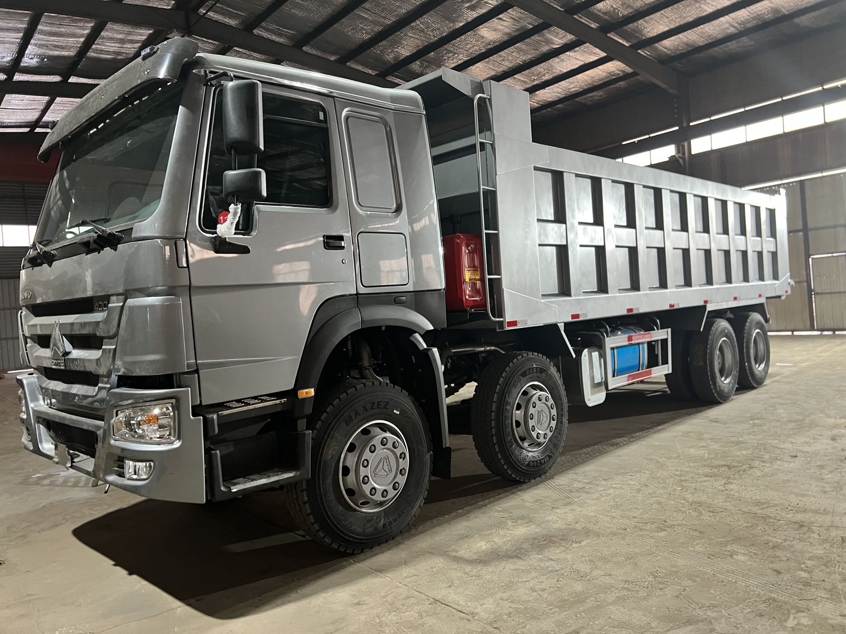 Silver grey refurbished HOWO 8x4 dump truck